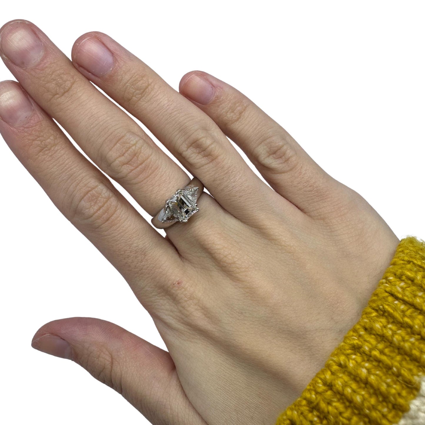 18K White Gold Emerald and Trillion Cut Diamond Three Stone Ring