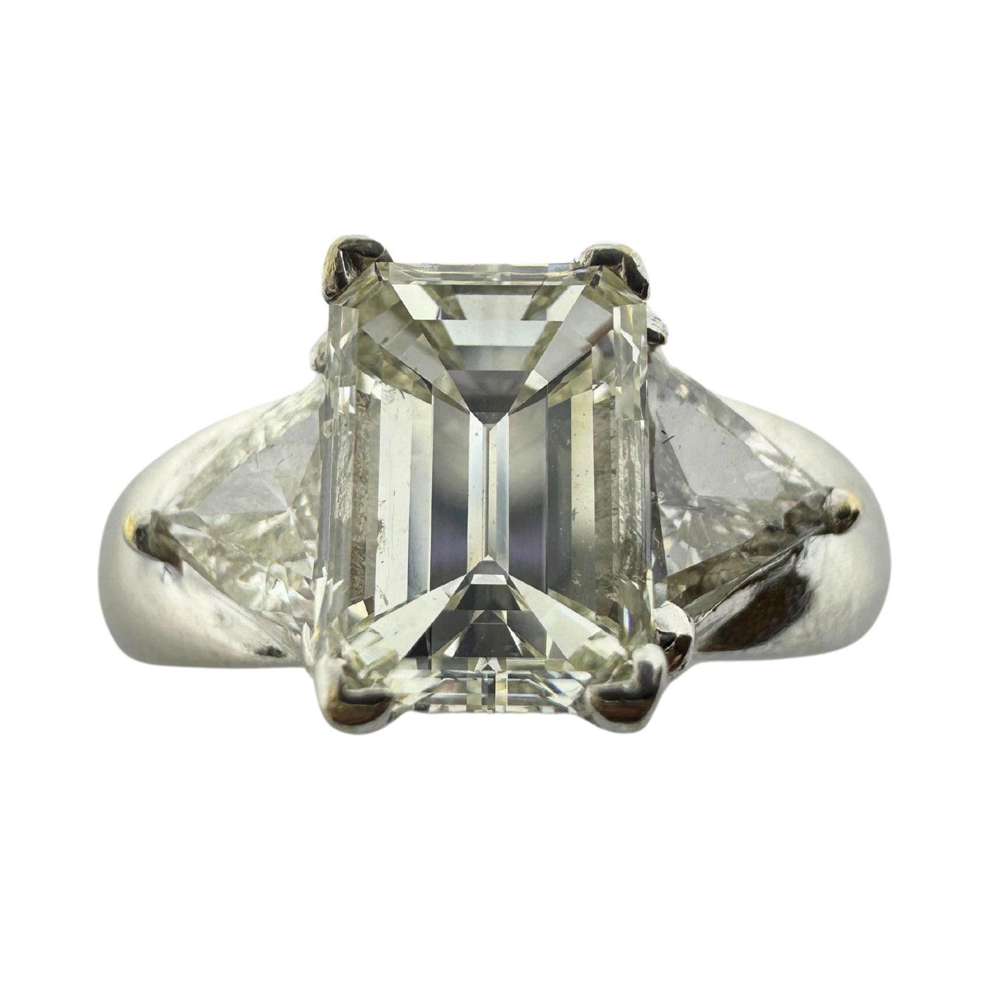 18K White Gold Emerald and Trillion Cut Diamond Three Stone Ring