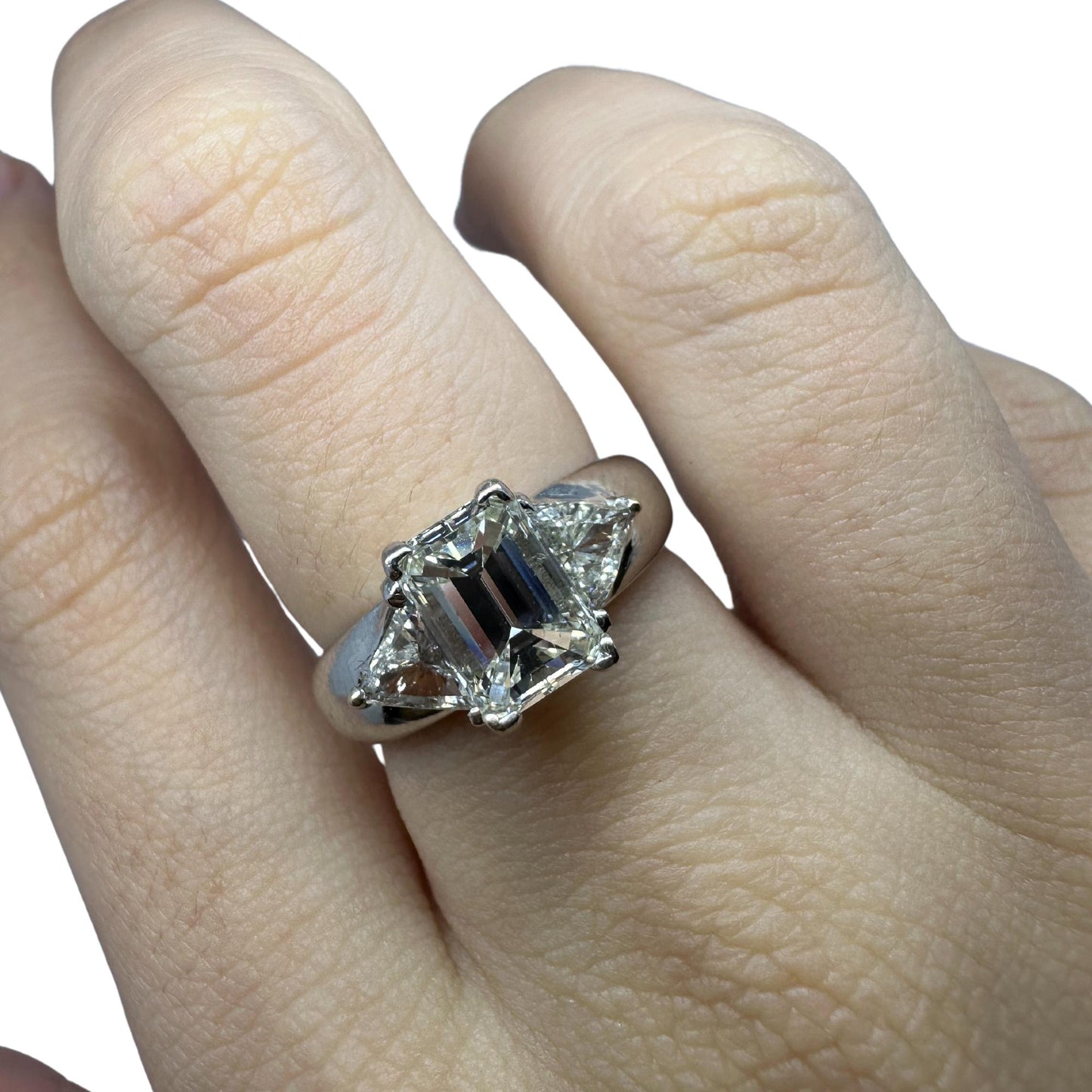 18K White Gold Emerald and Trillion Cut Diamond Three Stone Ring