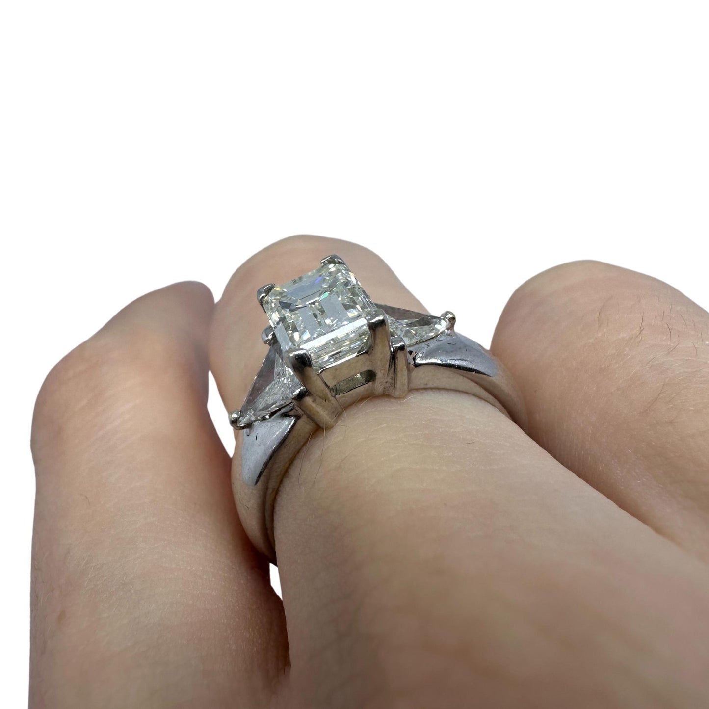 18K White Gold Emerald and Trillion Cut Diamond Three Stone Ring