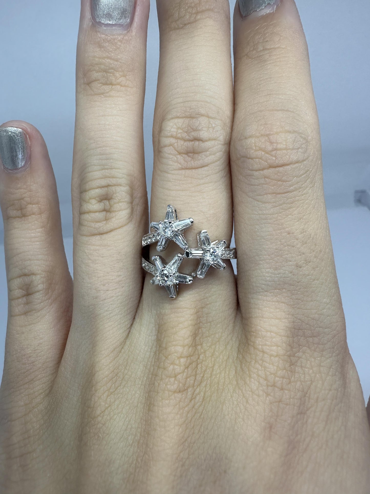18k Trillion Cut Diamond Ring with Star Design