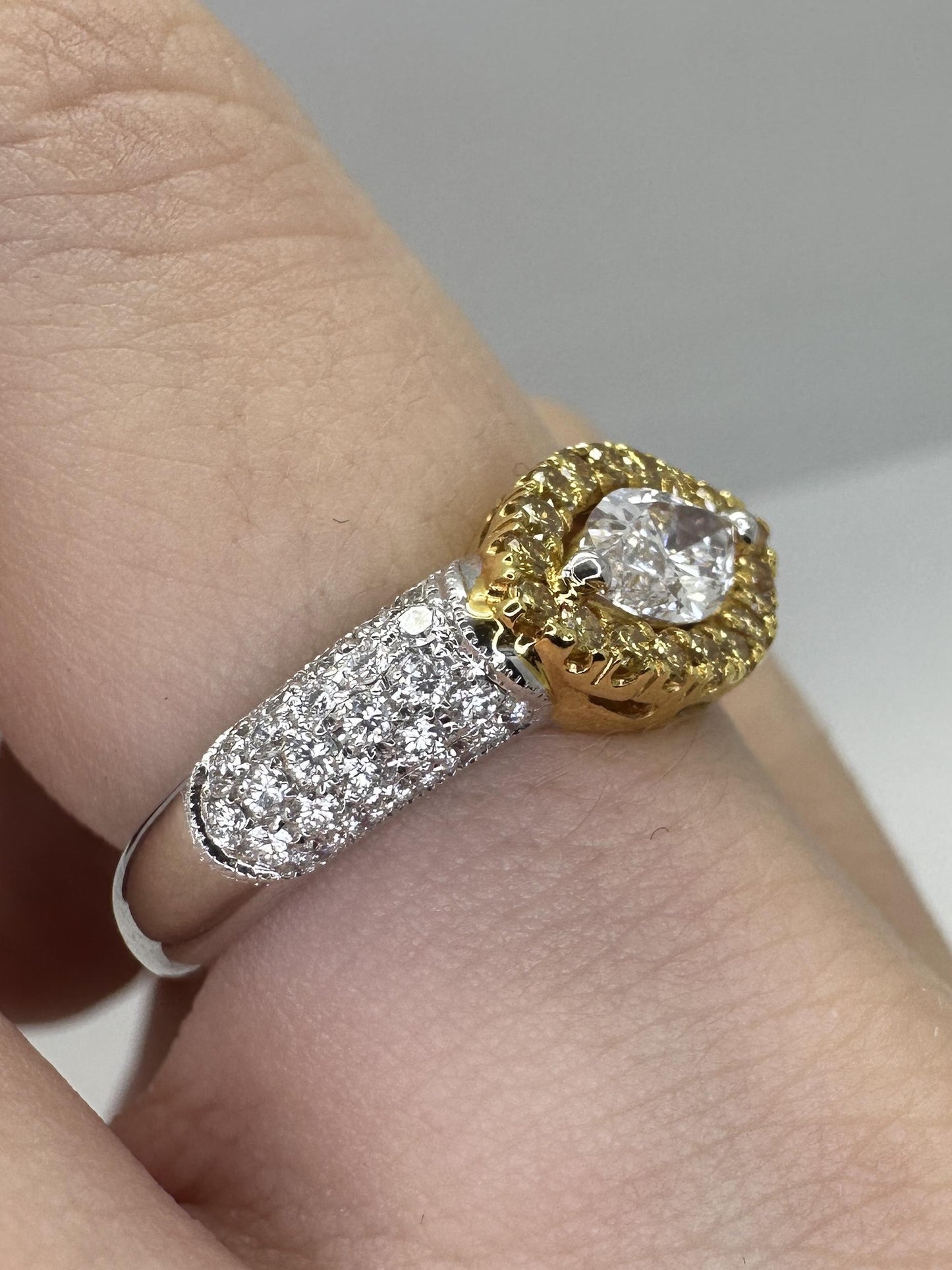 18k East-West Marquise Shaped Diamond Center and Yellow Diamond Halo Ring