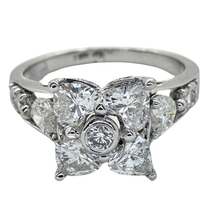 18k Diamond Ring with Floral Design and Side Heart Shaped Diamonds.