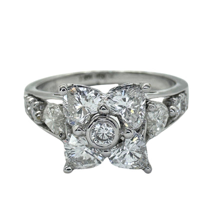 18k Diamond Ring with Floral Design and Side Heart Shaped Diamonds.