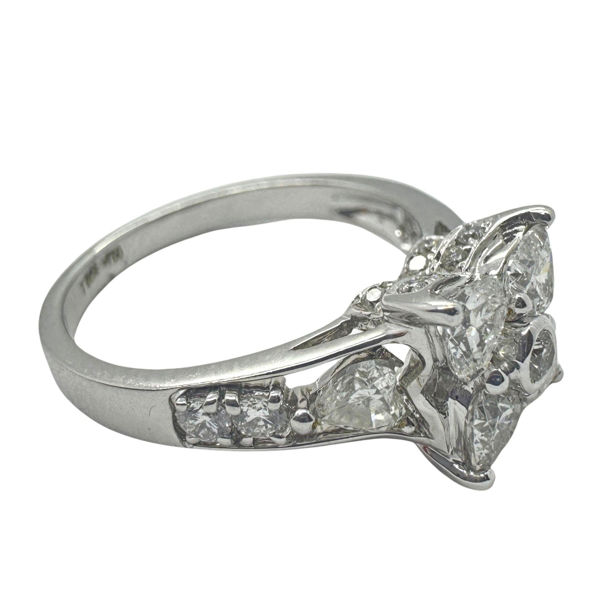 18k Diamond Ring with Floral Design and Side Heart Shaped Diamonds.