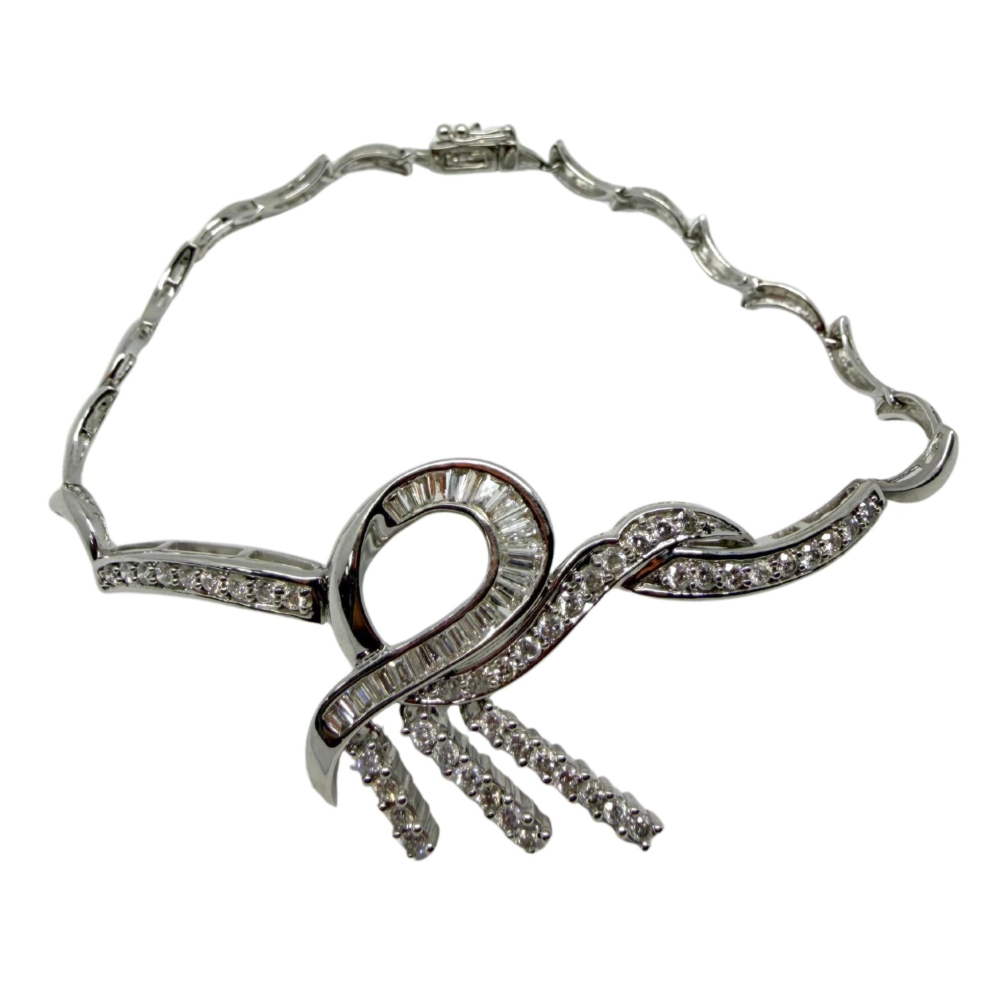 18k White Gold 1.43 Carat Tapered Baguette Cut Diamond Bow/Ribbon Bracelet