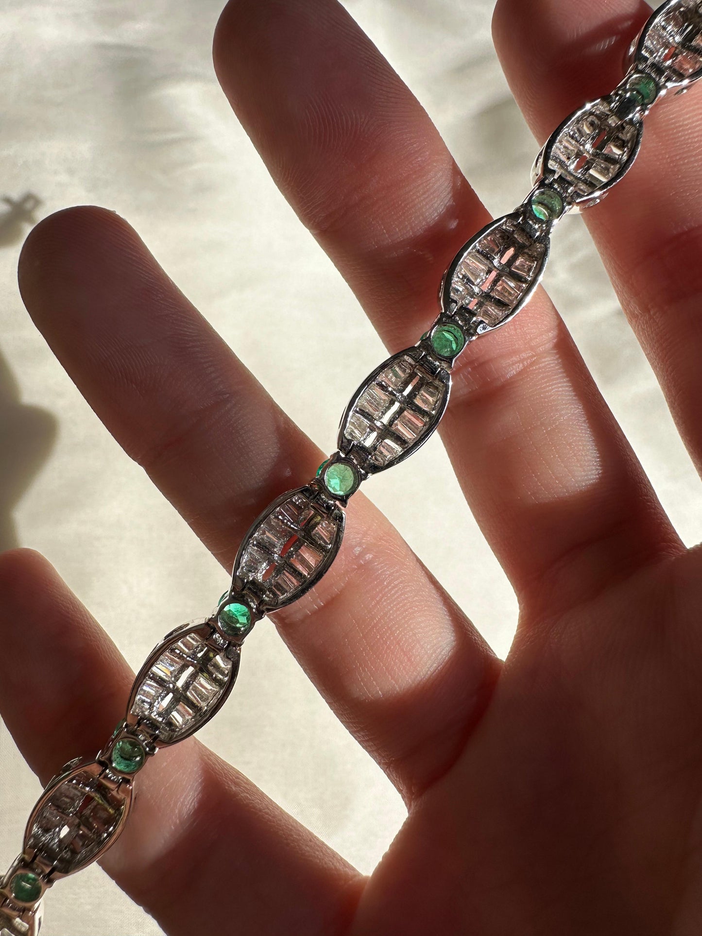 18K White Gold Tapered Baguette Diamond and Emerald Bracelet