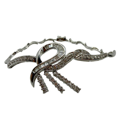 18k White Gold 1.43 Carat Tapered Baguette Cut Diamond Bow/Ribbon Bracelet