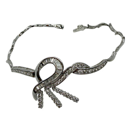 18k White Gold 1.43 Carat Tapered Baguette Cut Diamond Bow/Ribbon Bracelet