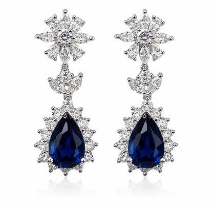 18K White Gold Diamond and 6.27 Carat Pear Cut Sapphire Earrings