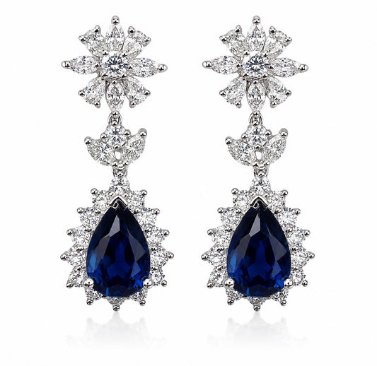 18K White Gold Diamond and 6.27 Carat Pear Cut Sapphire Earrings