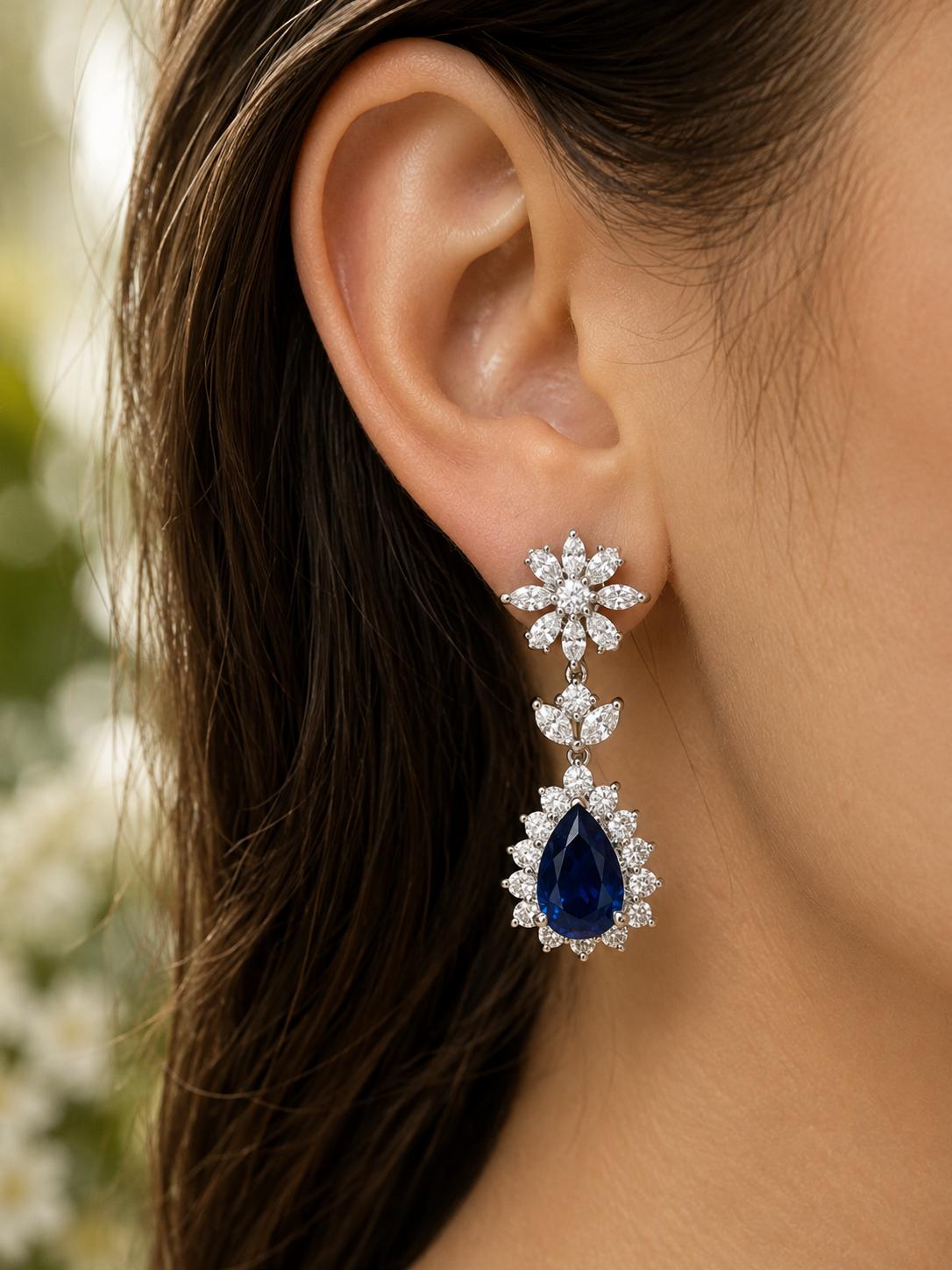 18K White Gold Diamond and 6.27 Carat Pear Cut Sapphire Earrings