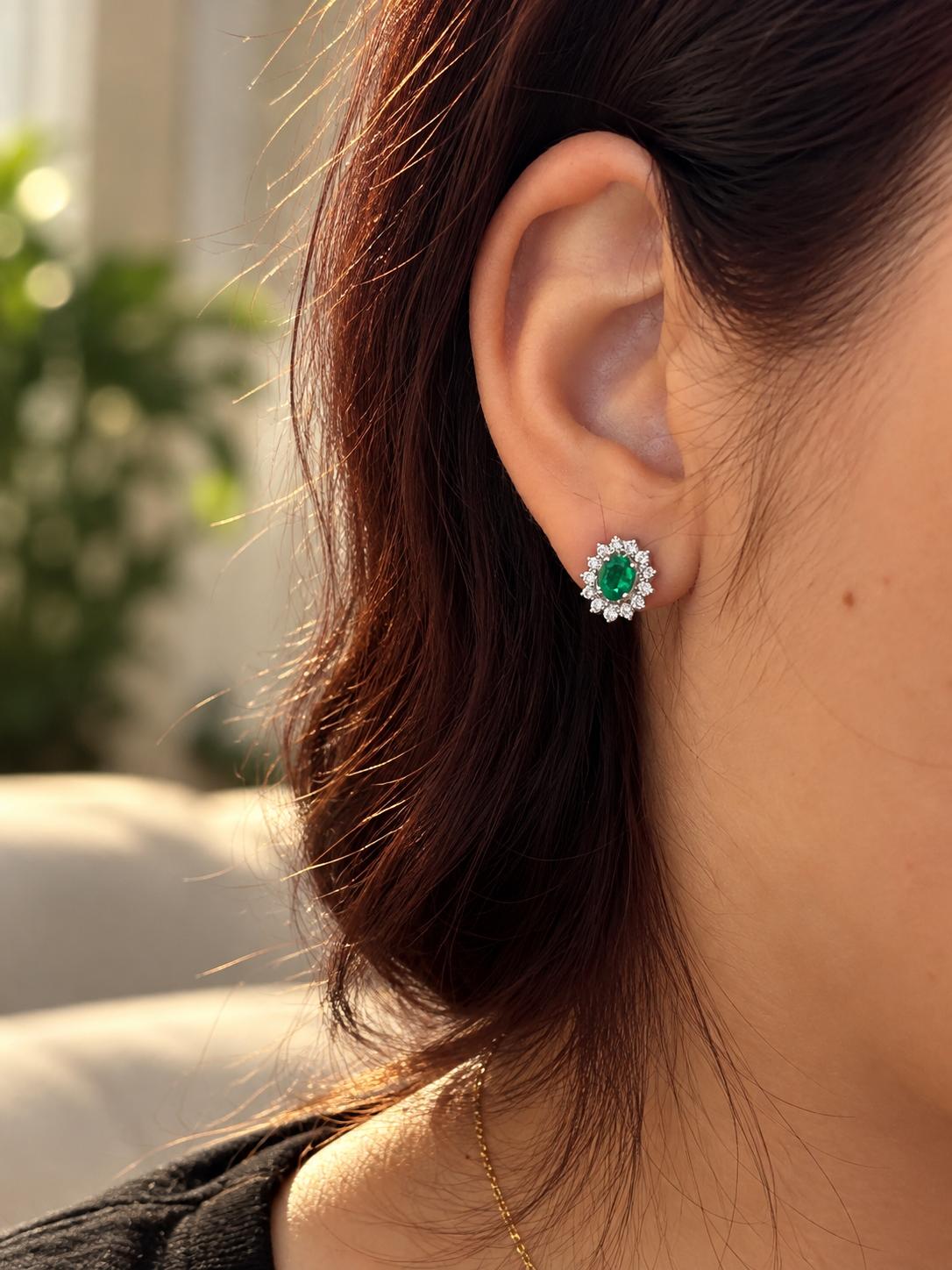 18k White Gold .56 Carat Oval Cut Emerald and Diamond Stud Earrings