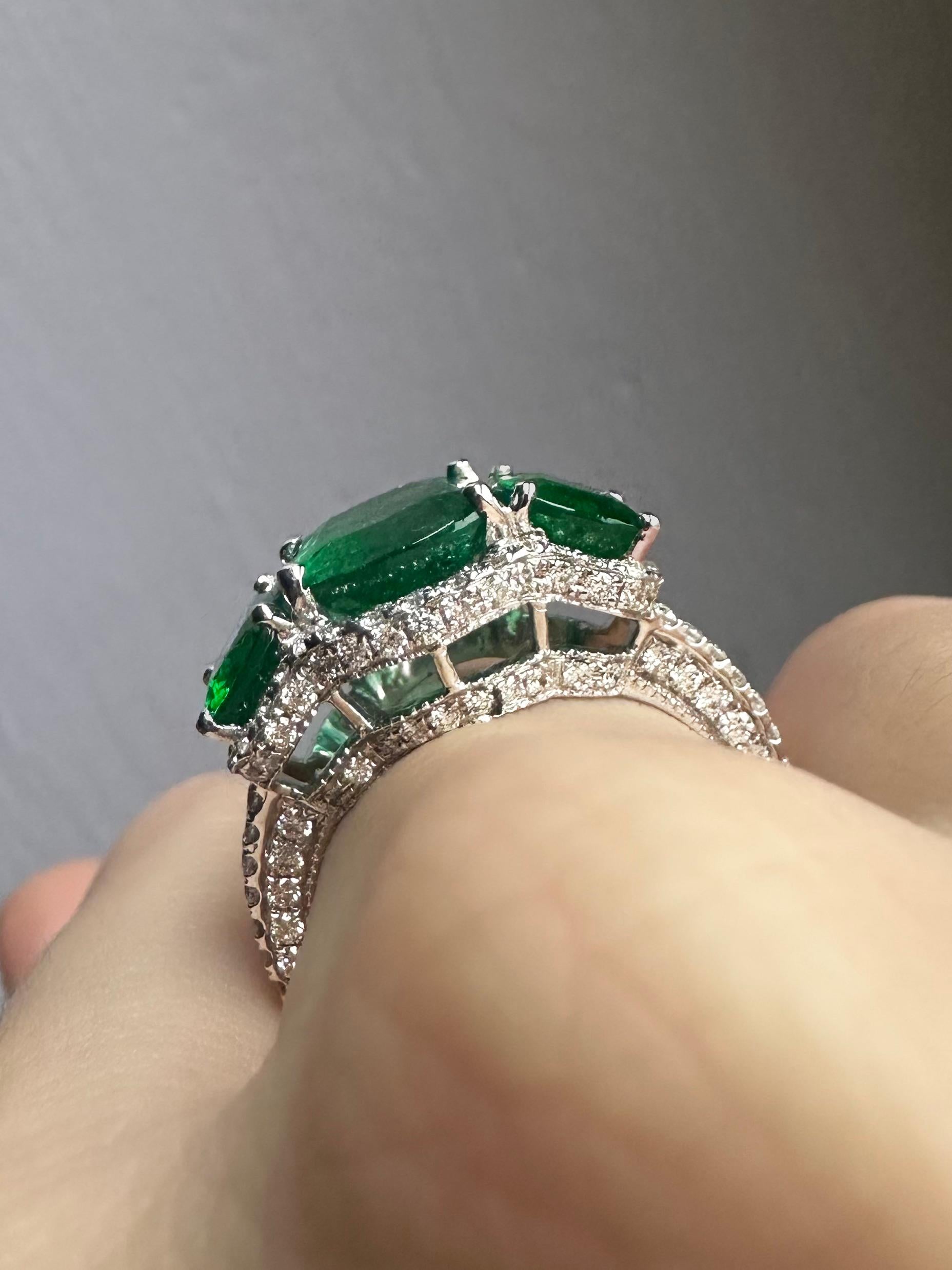 18K White Gold Diamond and Emerald Three Stone Ring