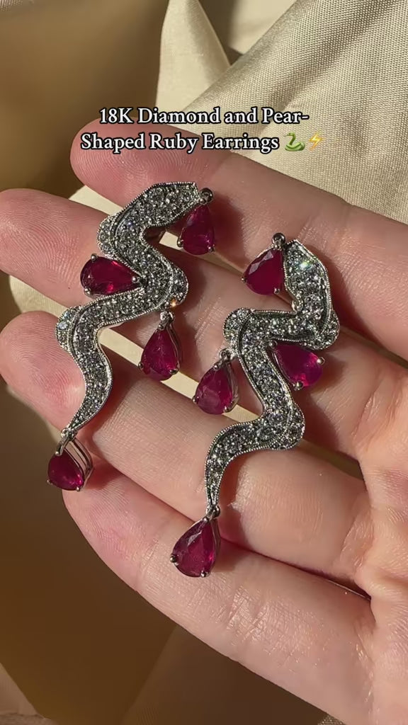 18K White Gold Diamond and 8.00 Carat Pear Shaped Ruby Snake Drop Earrings